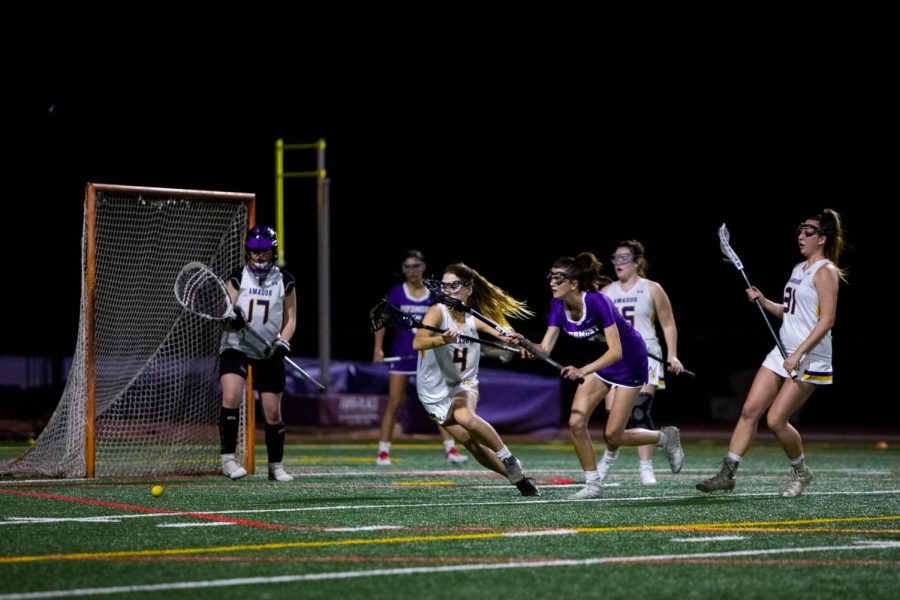 Amador's defense scrambles for the loose ball.