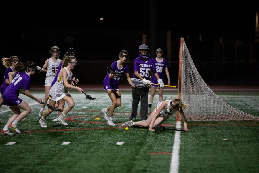 Amador attackers and Piedmont defenders all try to gain possession in front of the Piedmont goal.