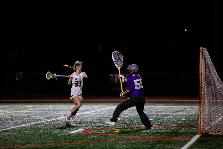 Molly Smith ‘22 takes a shot on the Piedmont goal.