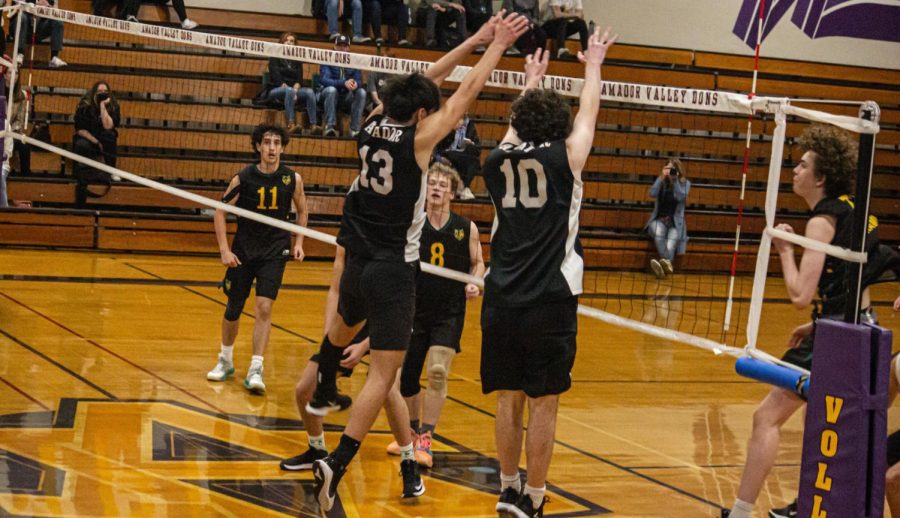 Colin Bowers (23) and Nate Clinton (23) succeed in a defense against San Ramon.