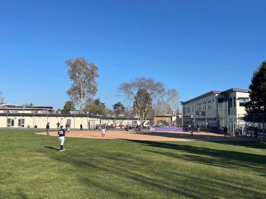 The team practicing for upcoming games on their home filed.