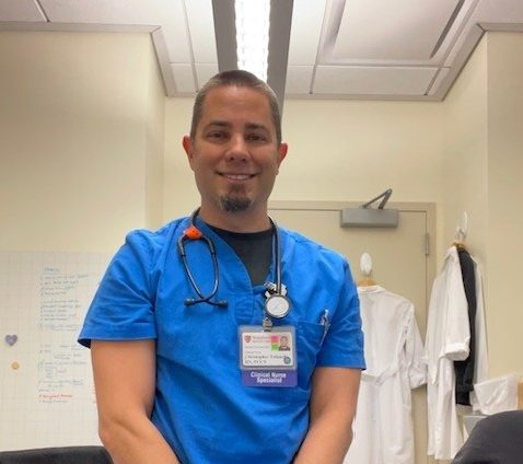 Tofanelli in his nursing scrubs on the job.