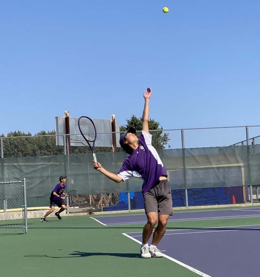 Bryan Park (23) making a photo-worthy serve during practice.