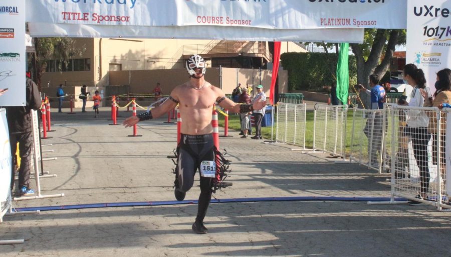 Bringing humor to the race, a participant ran in a mask during the 5K.