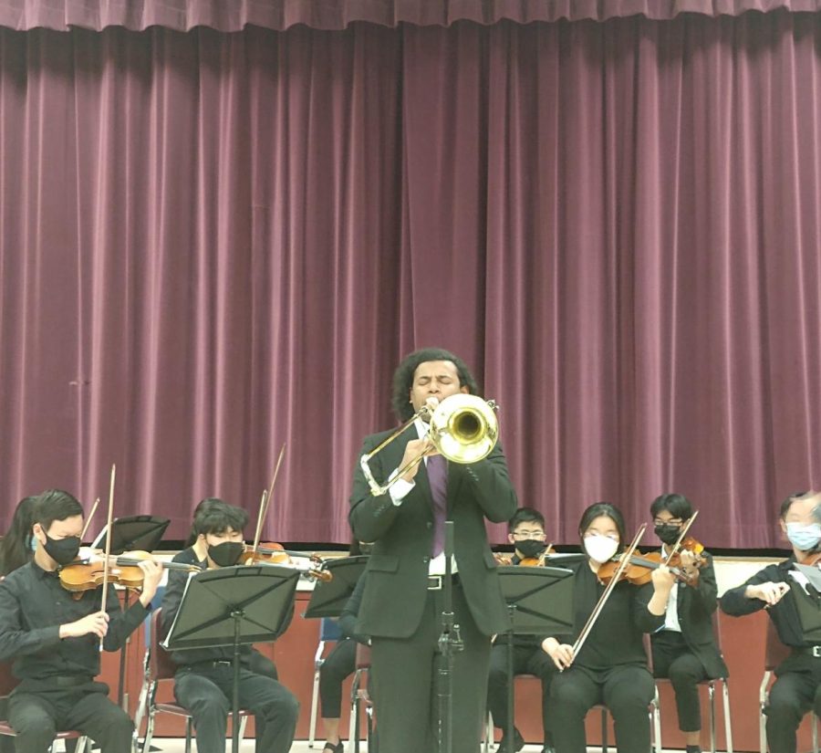 A trombonist plays in the concert.