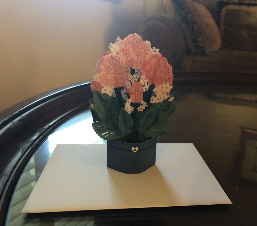 Mother's Day is the perfect time for card-giving. This card folds out into a three-dimensional paper bouquet.