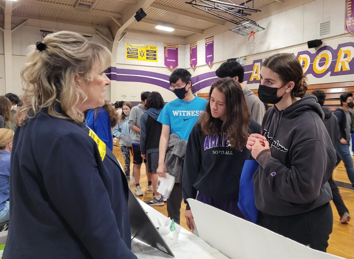 Students speak with local professionals at annual career fair