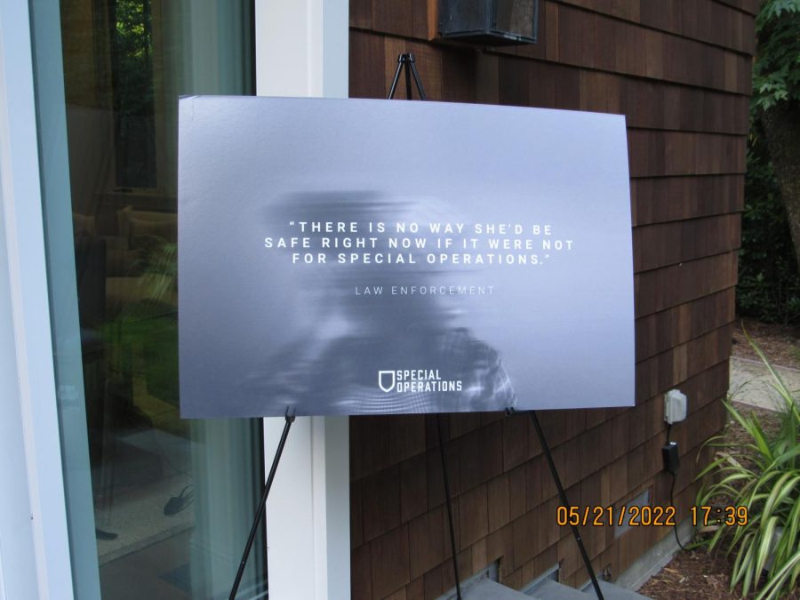 Multiple+signs+around+the+area+of+a+Special+Operations+fundraiser+encourage+guests+to+donate+to+help+the+cause+in+saving+children.