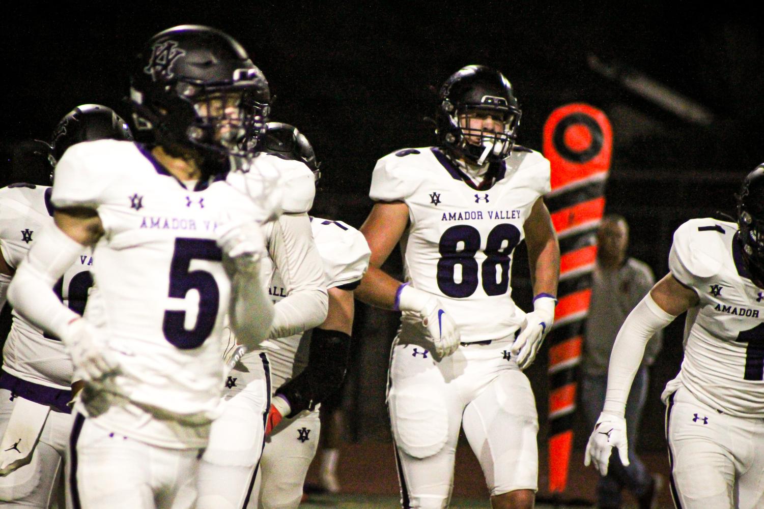 Dons go white out on a Saturday night football game against Menlo School