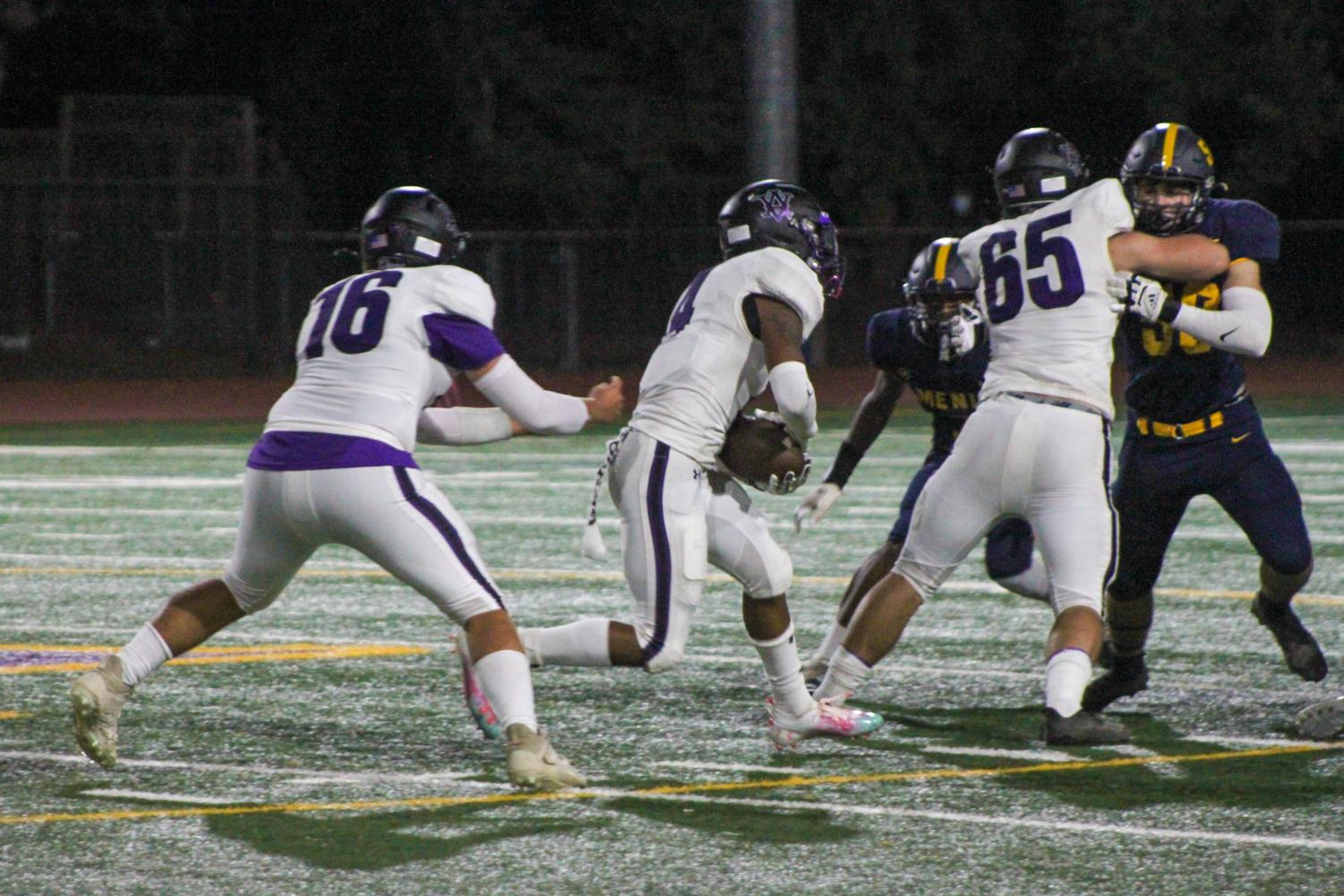 Dons go white out on a Saturday night football game against Menlo School