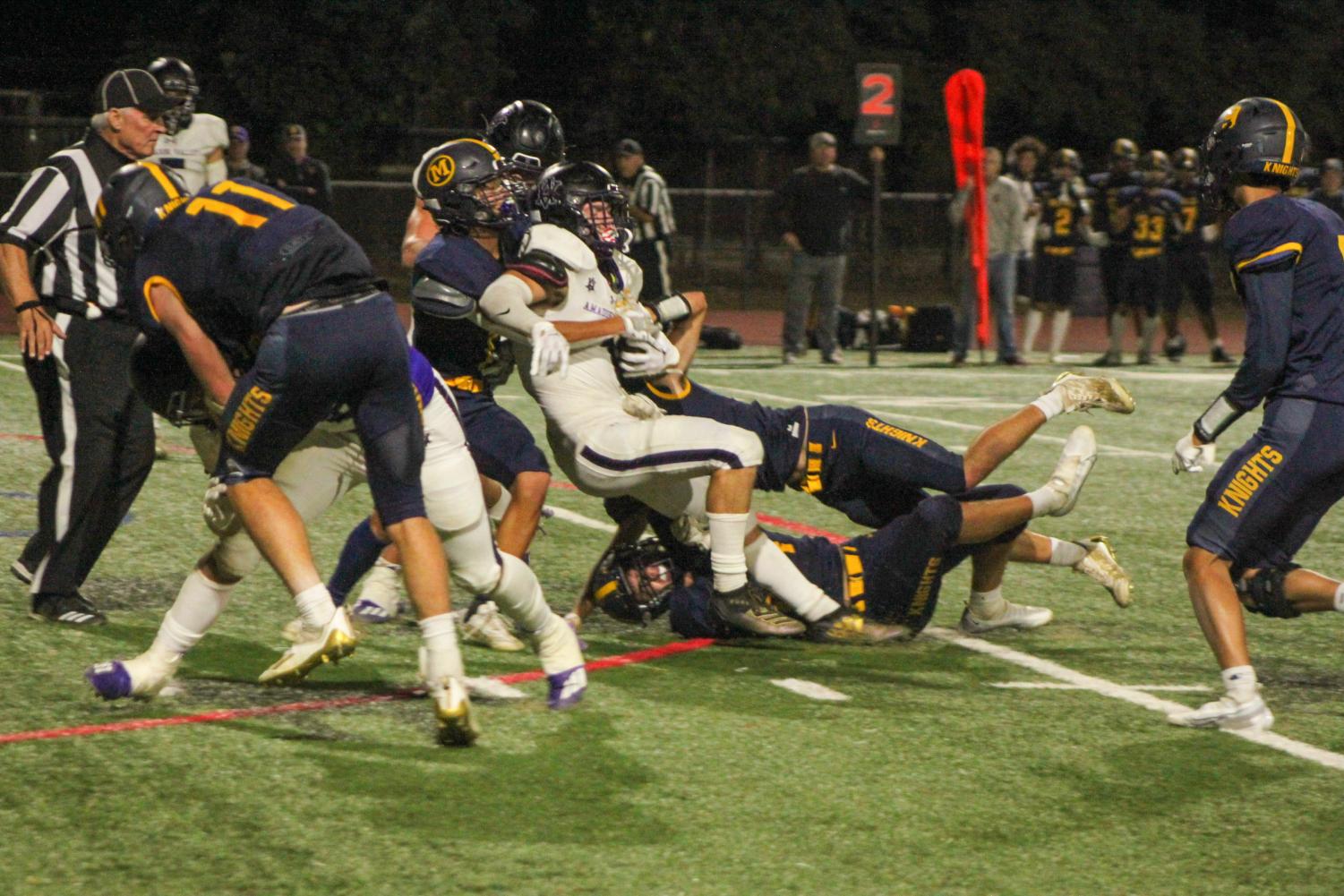 Dons go white out on a Saturday night football game against Menlo School