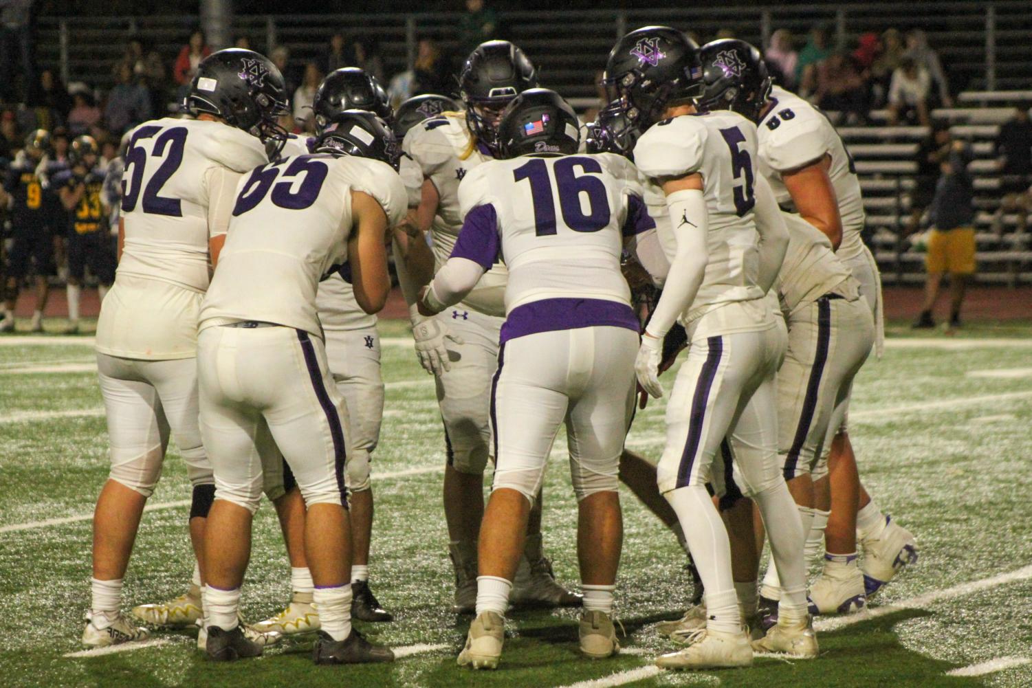 Dons go white out on a Saturday night football game against Menlo School