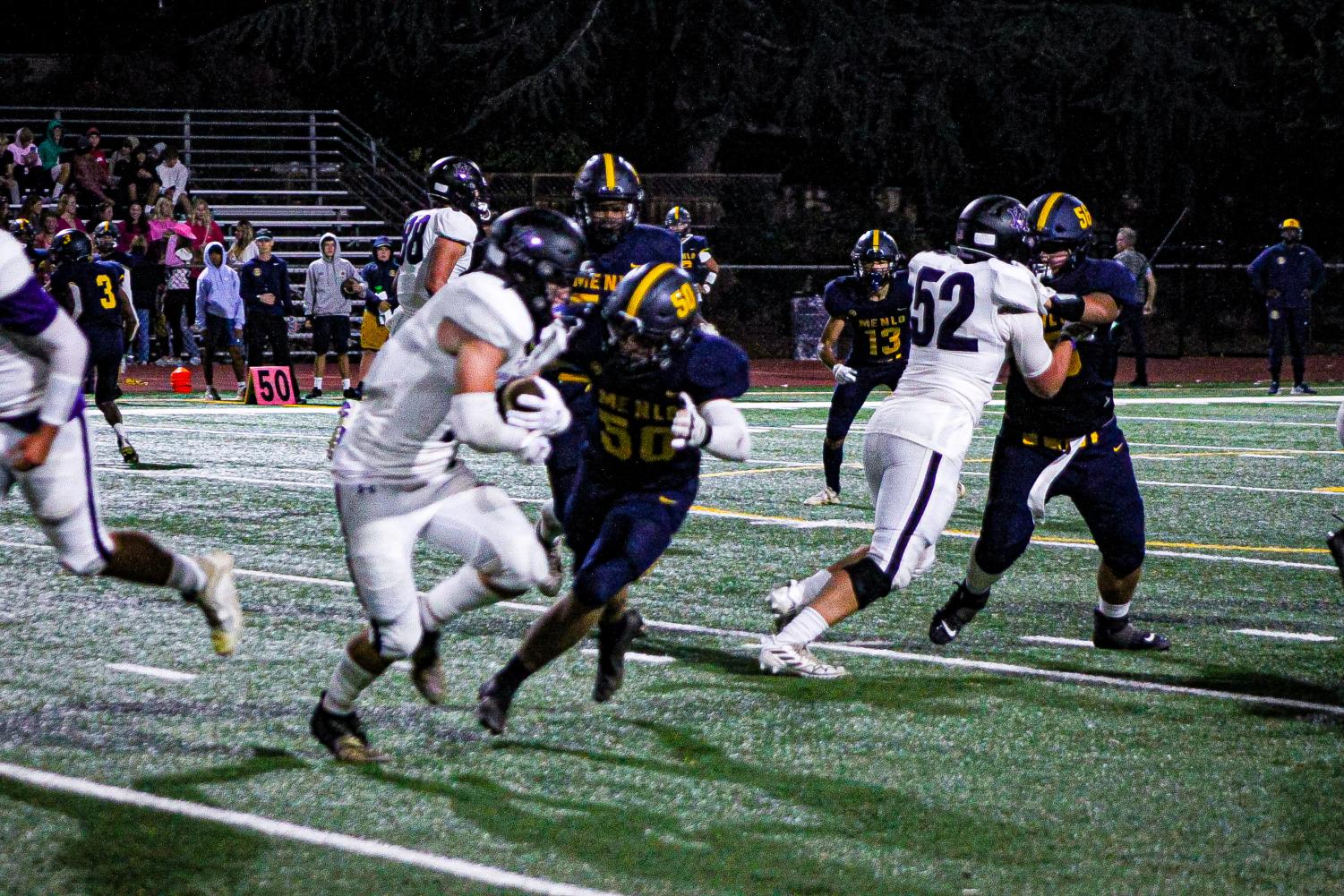 Dons go white out on a Saturday night football game against Menlo School
