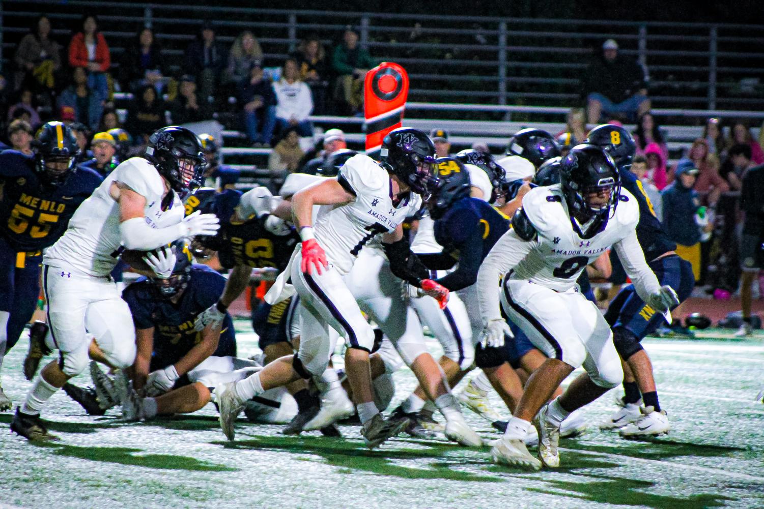 Dons go white out on a Saturday night football game against Menlo School