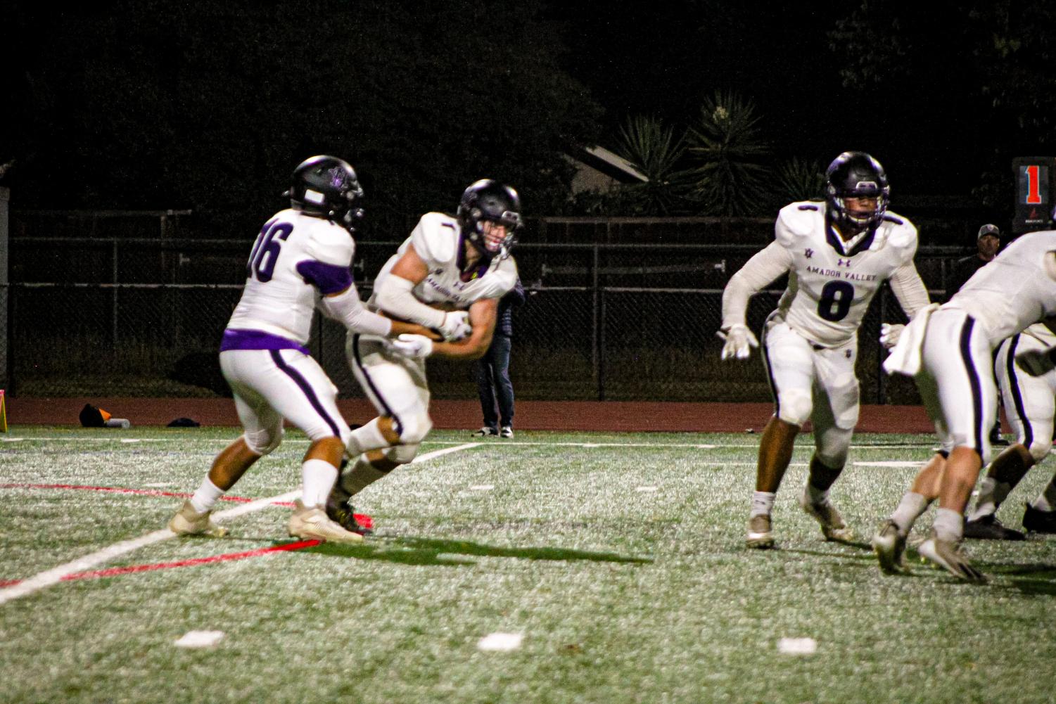 Dons go white out on a Saturday night football game against Menlo School