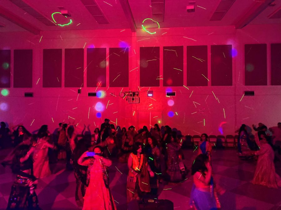 Disco lights and a DJ provided an atmosphere  of dance and music.