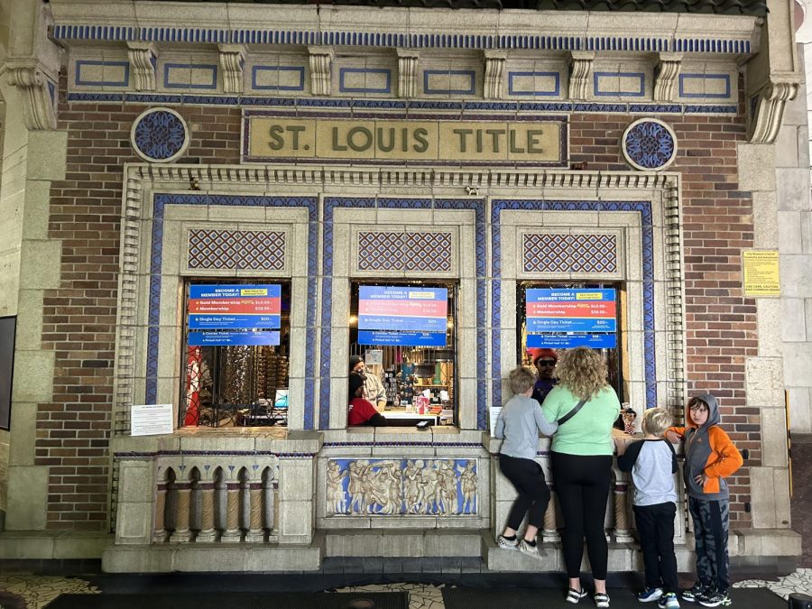 Upon entry, families purchase their tickets at the three tiled windows. 