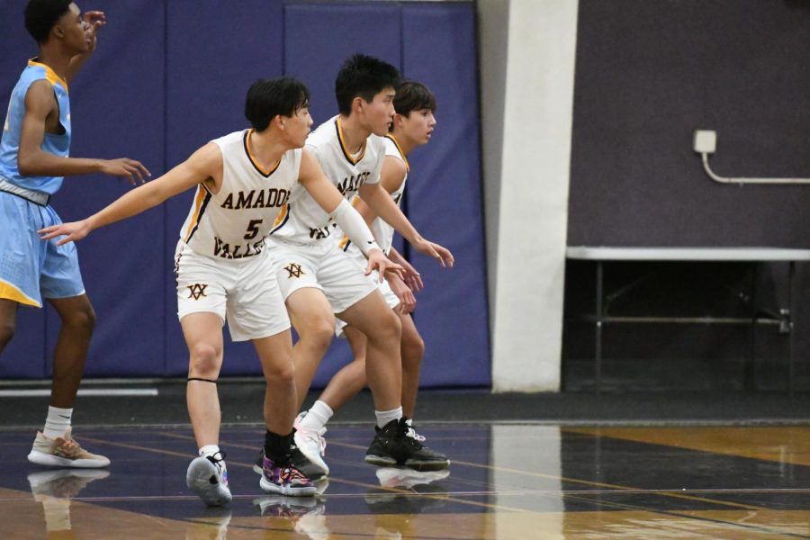 Jesse Huang ('23), Alex Liu ('24), and Tyler Cheng ('23) stand guard for the other team.