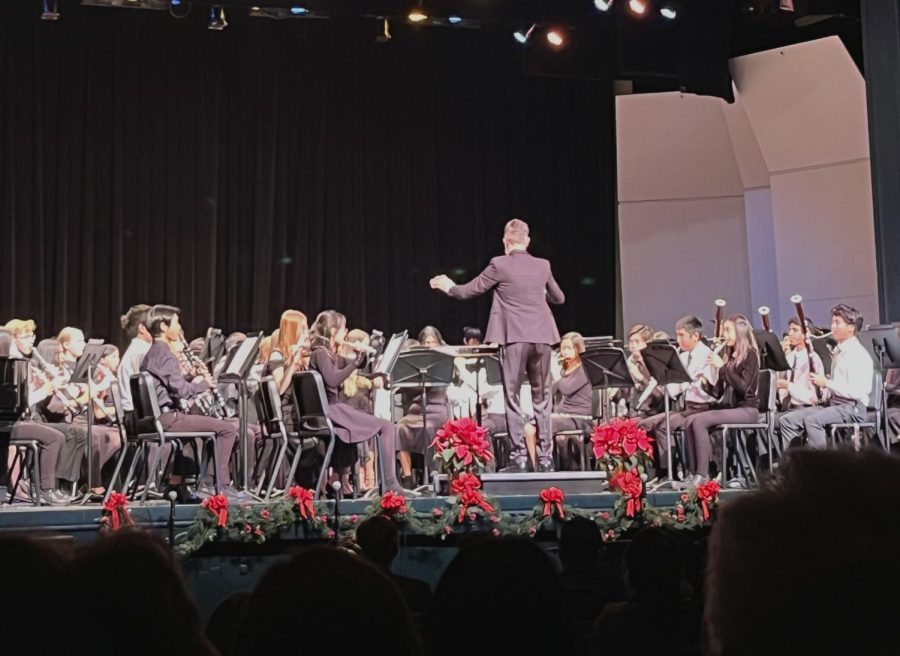 Director Jonathan Grantham directs the opening song of the Winter Concert.
