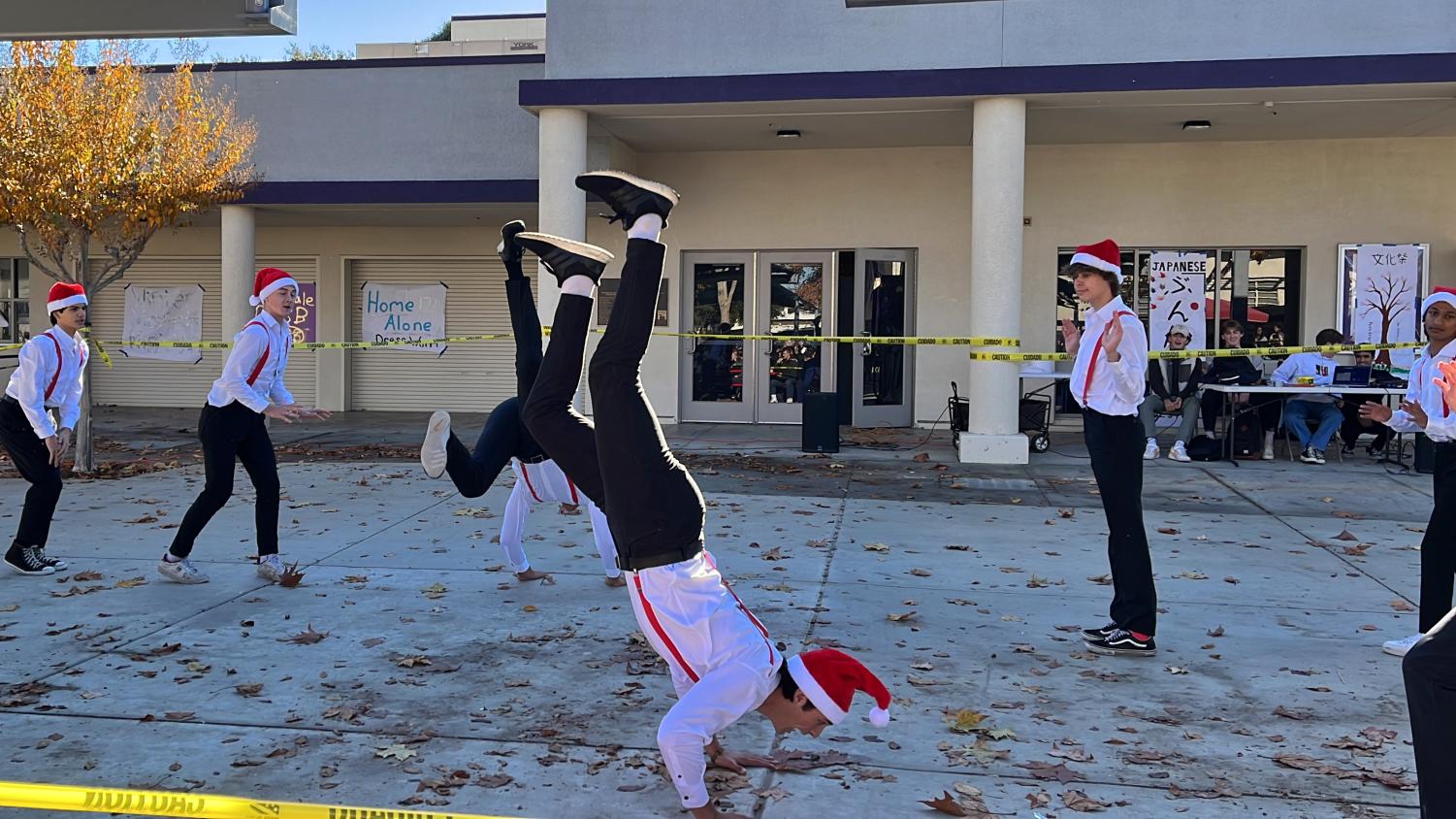 Mr. Amador introduces pageant participants with holiday dance