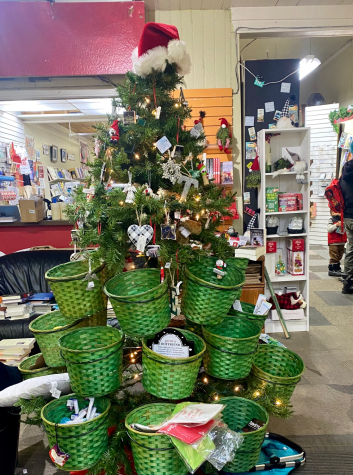 Towne Center Books set up a Christmas Tree made of goody baskets filled with various stocking stuffers.