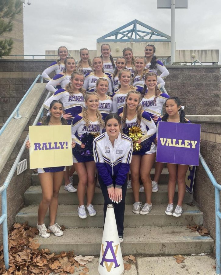 The Competition Cheer team poses for a group photo while at their regional competition.