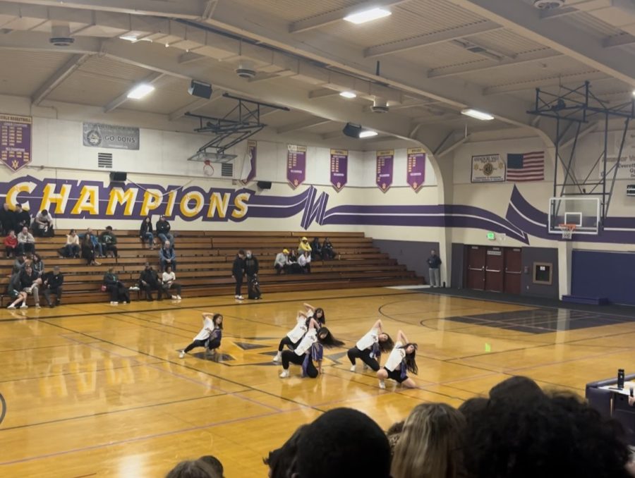 The+six+Amador+Dancers+show+off+their+talent+by+performing+at+halftime+during+the+Varsity+Basketball+game.