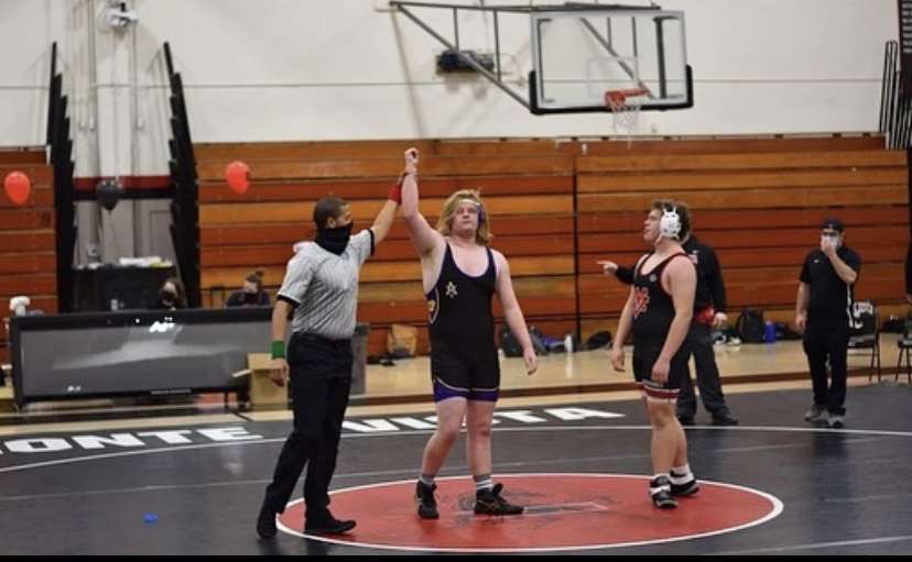 AJ Johnson (‘23) being named winner of his match against a Monte Vista opponent.