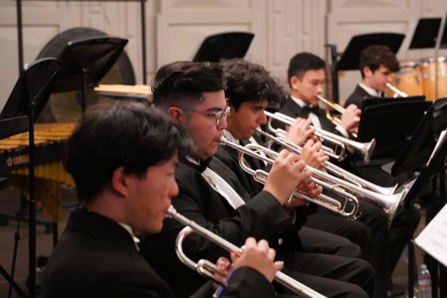 Trumpet players Kevin Zhu (‘23), Anthony Cardenas (‘24), and Steven Arguello (‘23) attentively play their prepared piece.