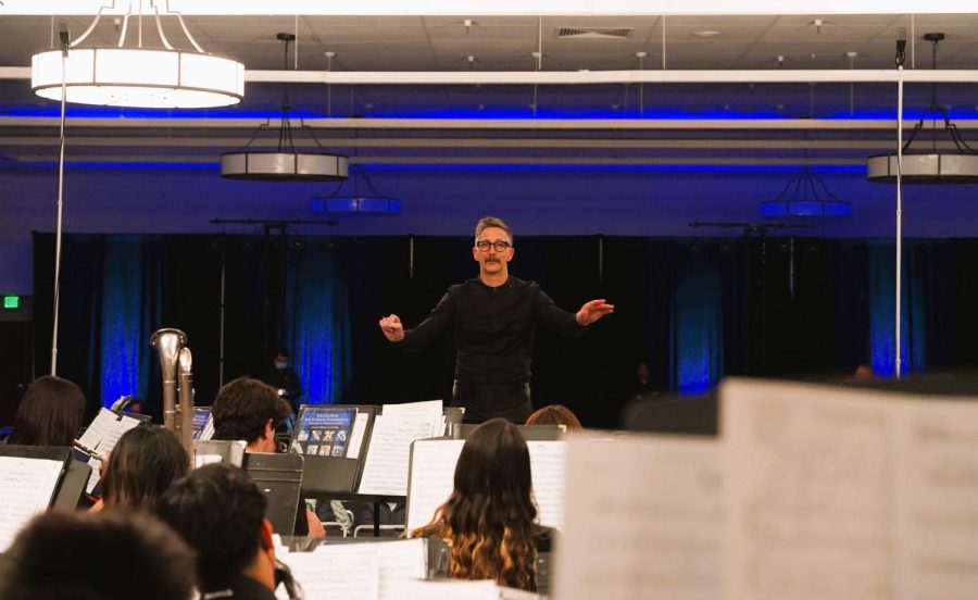 Band Director Jonathan Grantham boldly directs and leans over his Wind 1 students during their performances. 