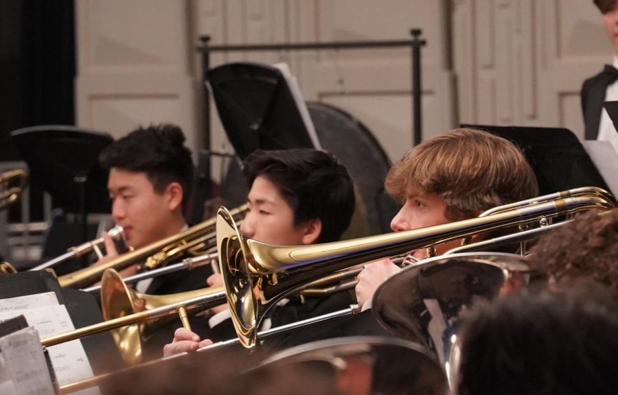 Trombone players Jayden Sano (‘24), Henry Tsay (‘24), and Brady McHargue (‘24) perform together.