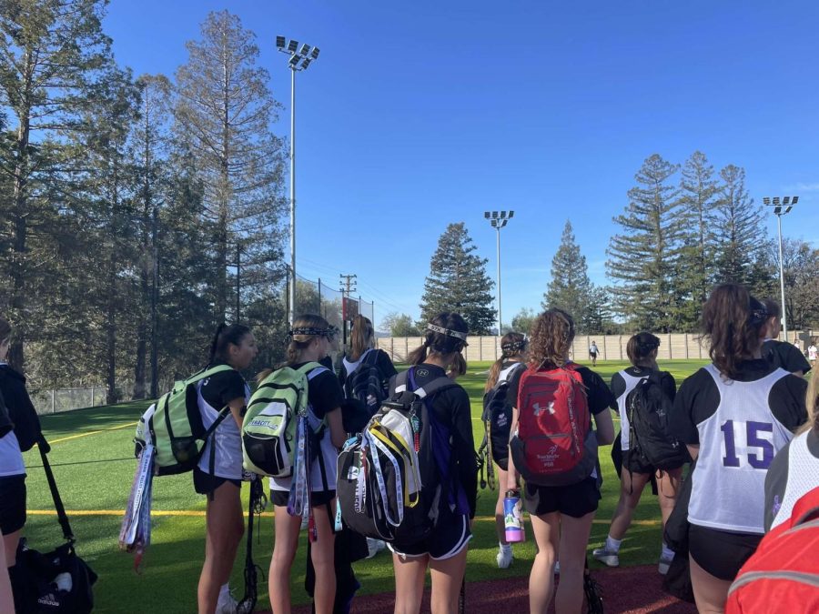 The Amador Valley girls lacrosse team prepares to take the field at the play day. 