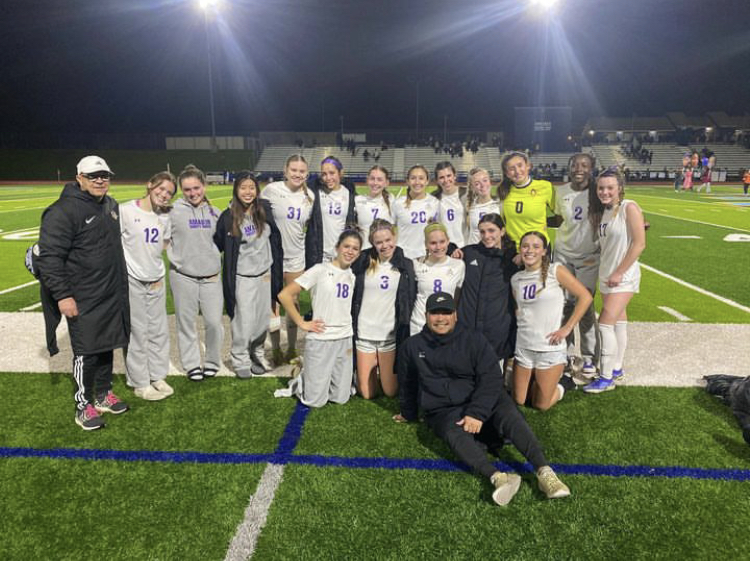 The team lines up for a photo after defeating Foothill High School by a score of 2-0 on Feb. 9.