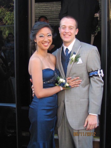 Social studies teacher Robert Palmer attended his wife’s senior ball. Here they are dressed up and posing together.