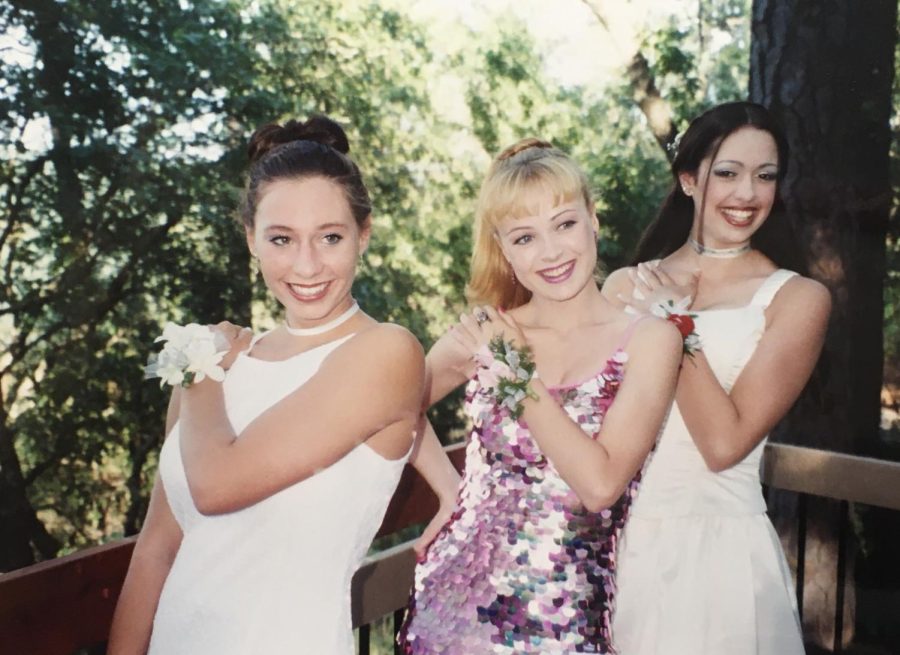 English teacher Stephanie Kamali went to prom near a lake. Here she poses with two of her closest friends from high school. They are still close friends today.