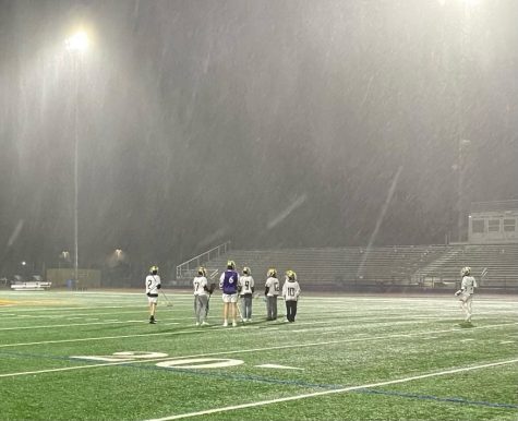 Boys Lacrosse plays rain or shine.