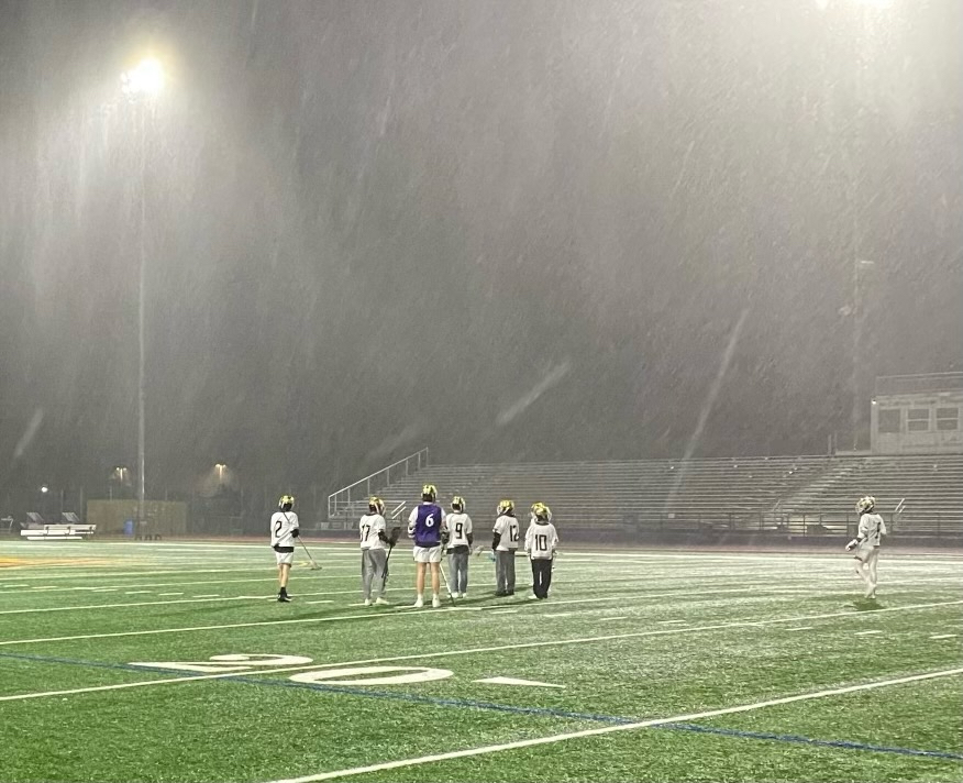 Boys+Lacrosse+plays+rain+or+shine.