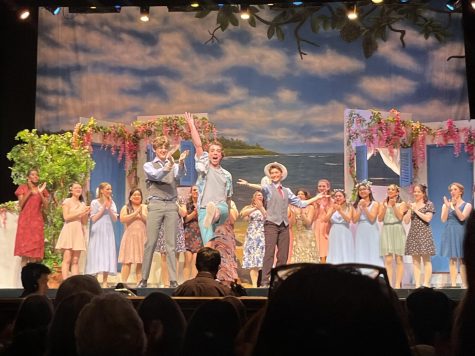 The cast and crew of Mamma Mia go through curtain call at the end of the performance.