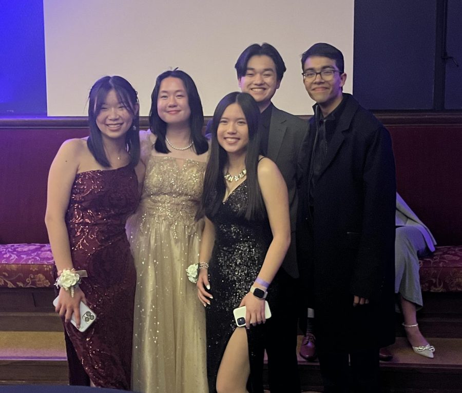 Juliana Yang ('24), Clara Yin ('24), Kathryn Go ('24), Brandon Huynh ('24), and Runab Dixit ('24) pose for the camera.