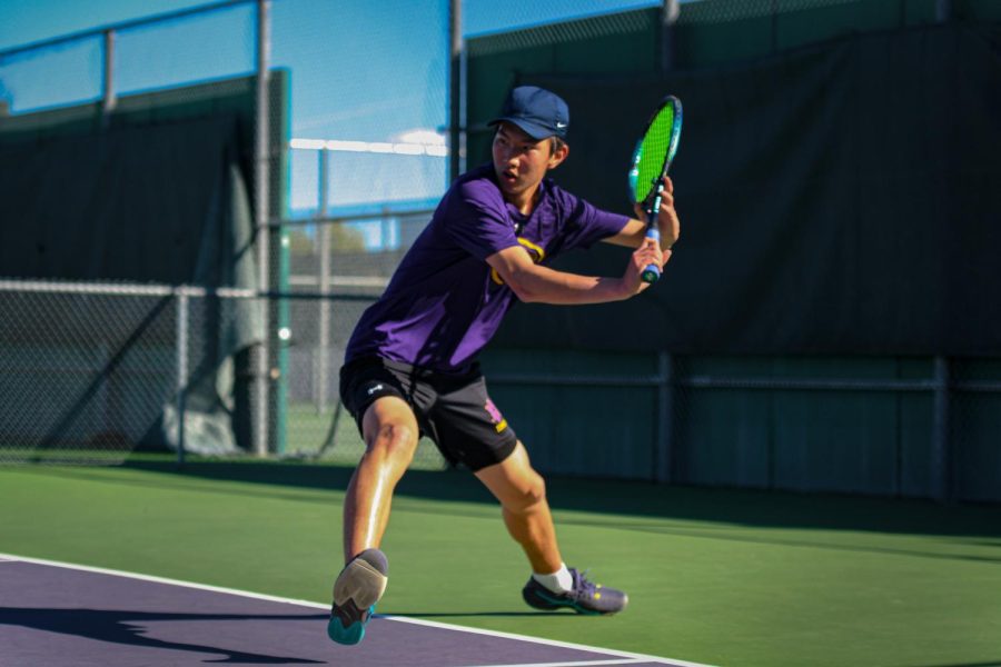 Minsung Kim gets low and prepares to slice a backhand.
