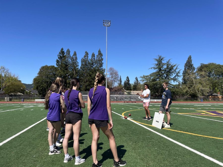 AV girls discuss their strategy to prepare for the Powder Puff game.