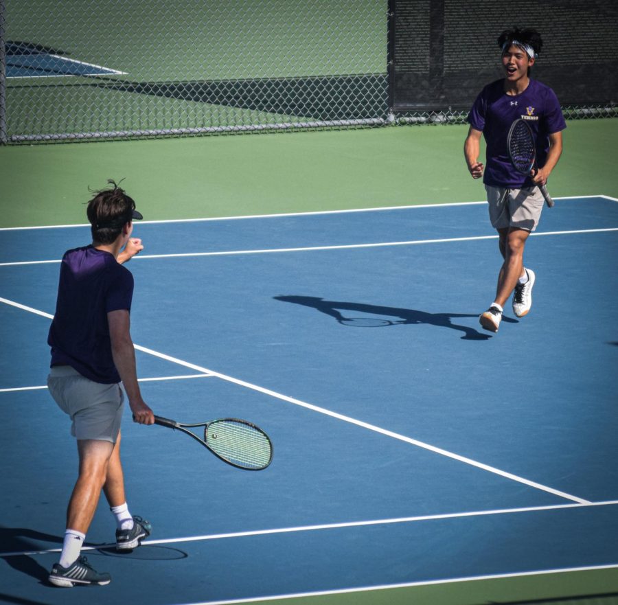 Playing in the semifinals of the EBAL doubles tournament as the third seed, seniors James Heeter (23) and Bryan Park (23) celebrate together after an incredible point.