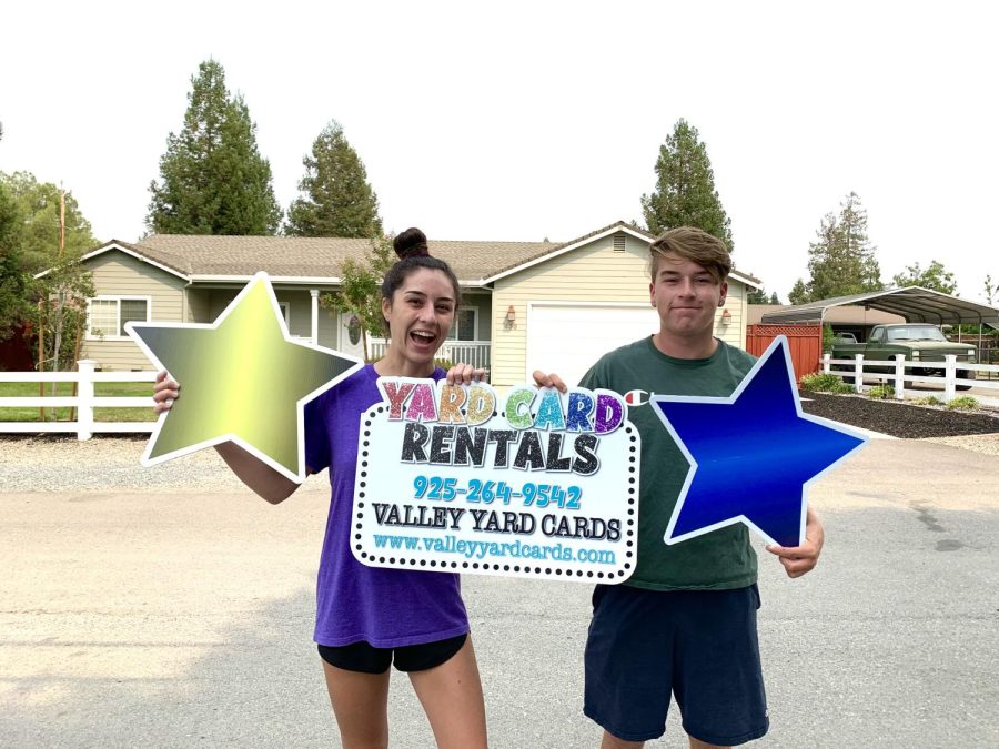 Genevieve Taylor (20), pictured left, runs Valley Yard Cards, a small local business that provides yard signs for special occasions.