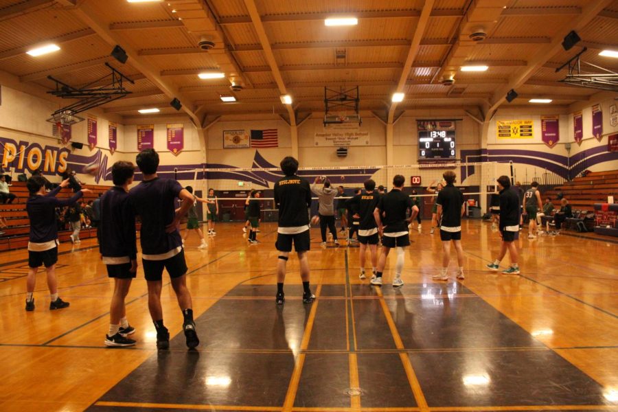 The Volleyball team gets ready to receive a serve against De La Salle.