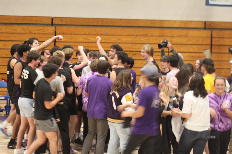 The team celebrate the win with audience members.