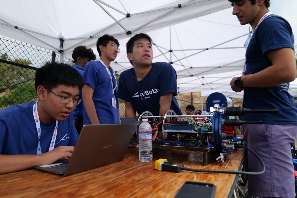 AVBotz team engages in intense delliberations to elevate their RoboSub competition performance.