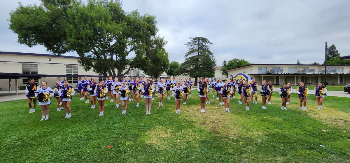 The cheer team warming up for their routine.