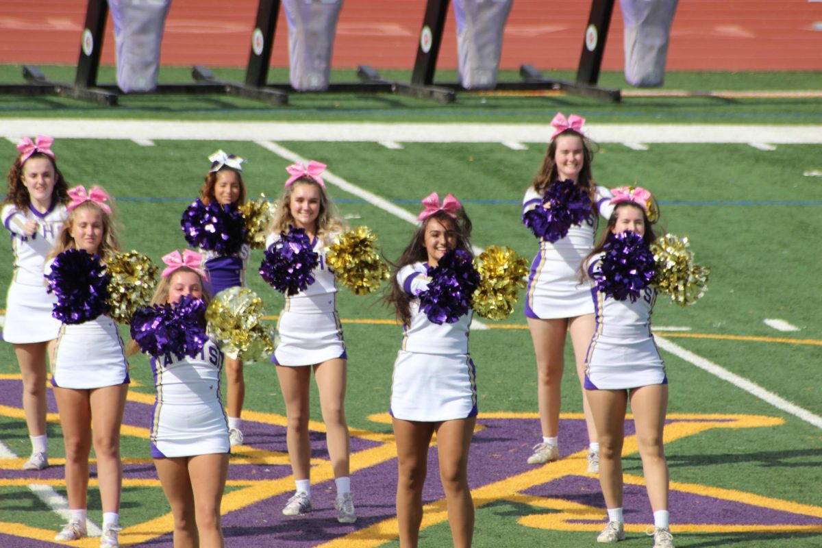 Amador Cheerleaders assemble into a difficult formation.