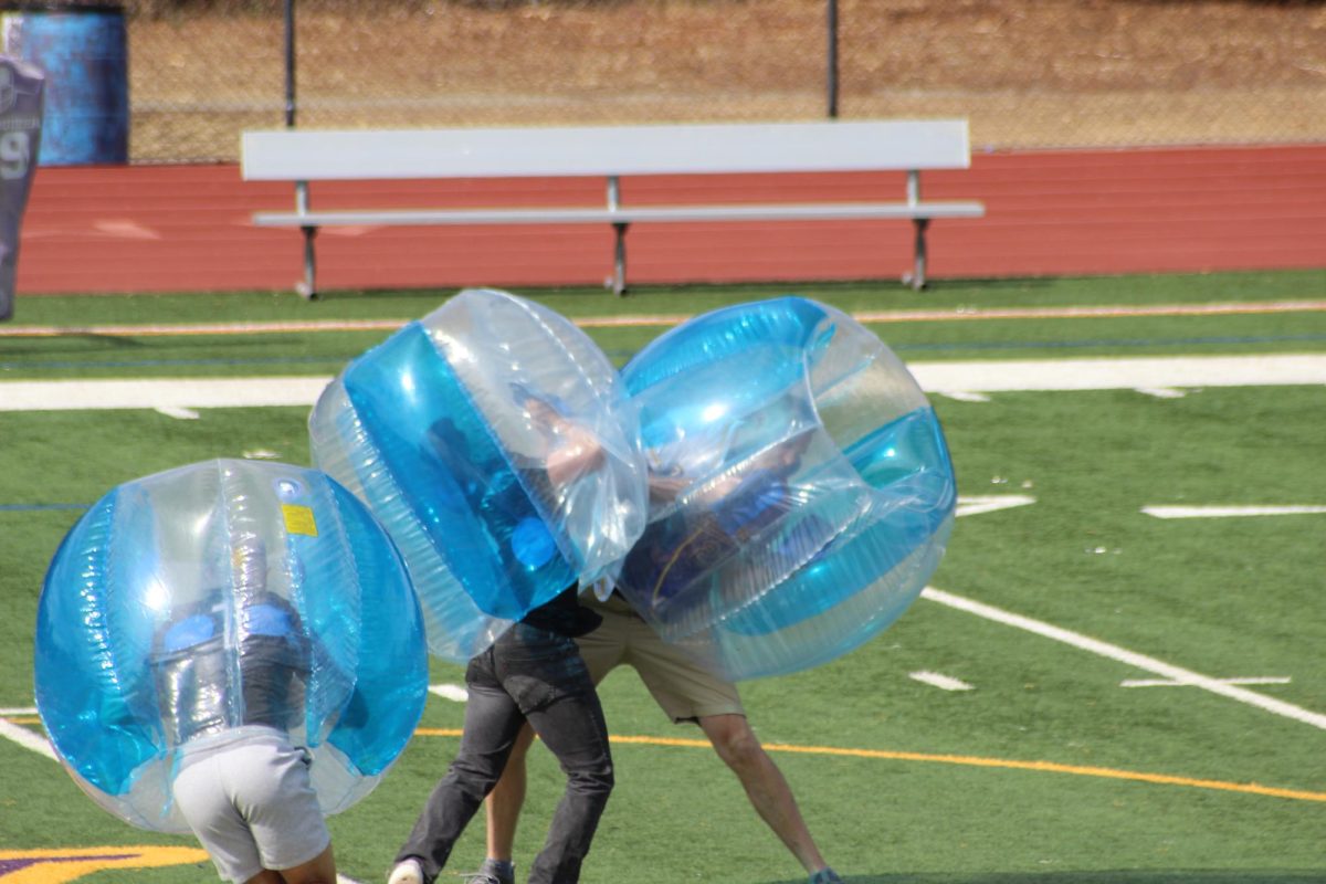 Students and teachers go head to head during the bubble showdown.