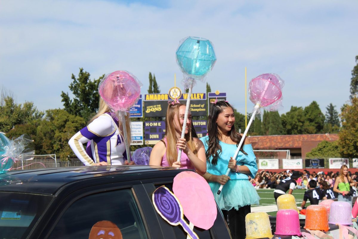 Juniors atop their colorful parade float.